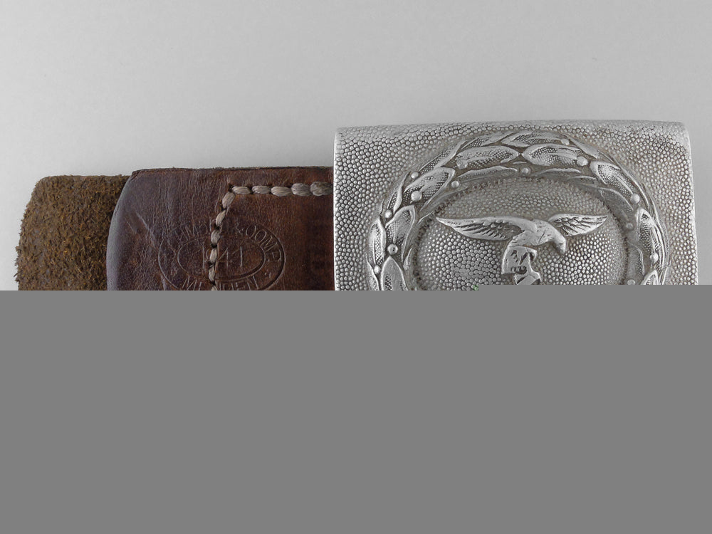 a_luftwaffe_belt_buckle_and_leather_tab;_marked“_regiment_h._goering”_i_112