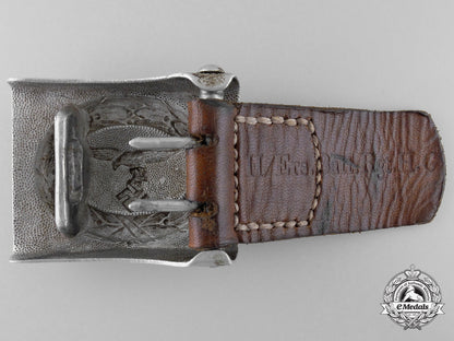 a_luftwaffe_belt_buckle_and_leather_tab;_marked“_regiment_h._goering”_i_113