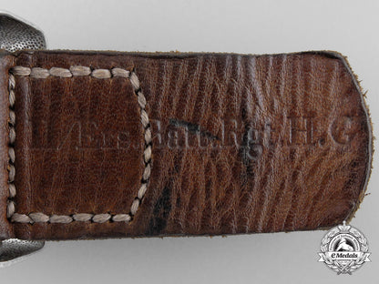 a_luftwaffe_belt_buckle_and_leather_tab;_marked“_regiment_h._goering”_i_115