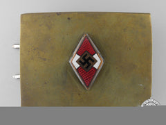 An Hj Belt Buckle With Enamels