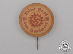 A 1935 Daf “Deine Hand Dem Handwerk” Badge