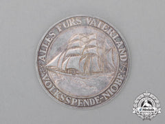 A 1932 Donation Coin For The Sinking Of The Training Vessel Niobe