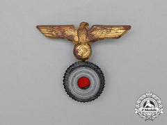 A Kriegsmarine Sailor’s Cap Eagle And Cockade Insignia