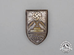 A 1933/34 Whw “We Are Helping” Donation Badge