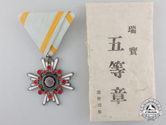 A Japanese Order Of The Sacred Treasure With Packet Of Issue