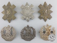 Six First & Second War British Highlander Cap Badges