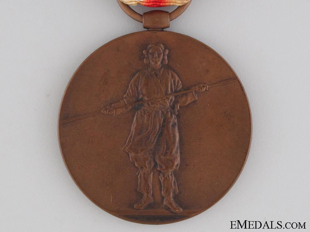 a_cased_wwi_japanese_victory_medal_img_0233_copy.jpg52fd061fb7a70