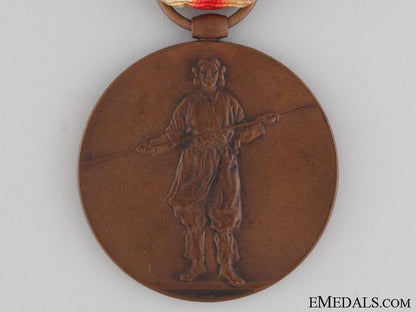 a_cased_wwi_japanese_victory_medal_img_0233_copy.jpg52fd061fb7a70