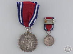A George V 25 Year Jubilee Medal With Miniature