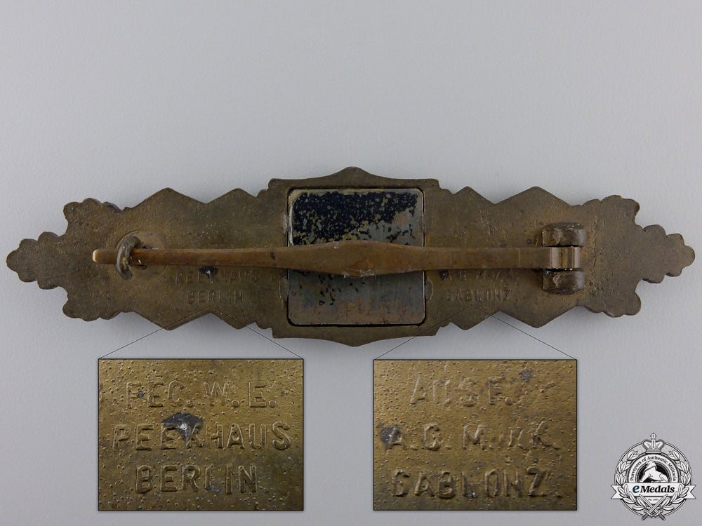 a_bronze_grade_close_combat_clasp_by_fec._w.e.peekhaus_img_02.jpg551c32e7bd3a9