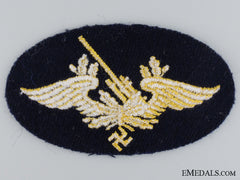 A  Kriegsmarine Coastal Artillery Cloth Insignia