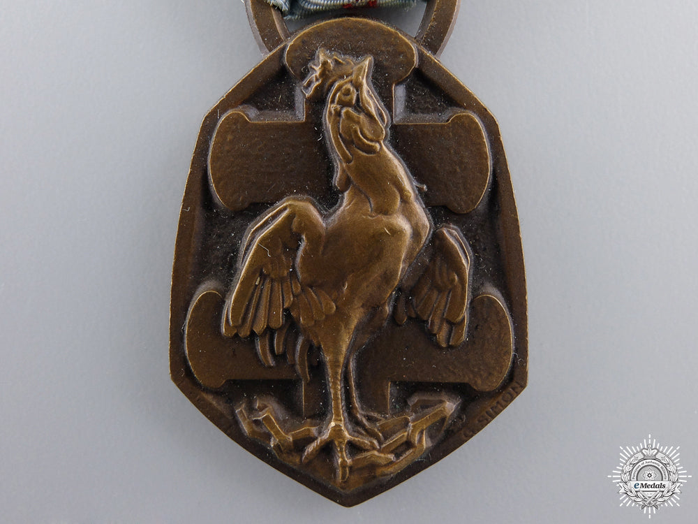 a_wwii_french_commemorative_medal_for_the_african_theatre_war_img_02.jpg54d8e5a6b69eb
