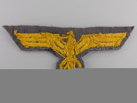 a_kriegsmarine_officer’s_breast_eagle_img_02.jpg555f958d1786b