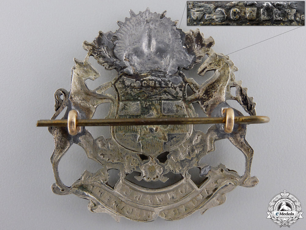 a_second_war_calgary_regiment(_tank)_cap_badge_img_02.jpg551c187b446f4