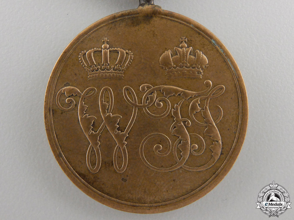 a1864_prussian_denmark_war_medal_for_combatants_img_02.jpg5565c1d3099e8