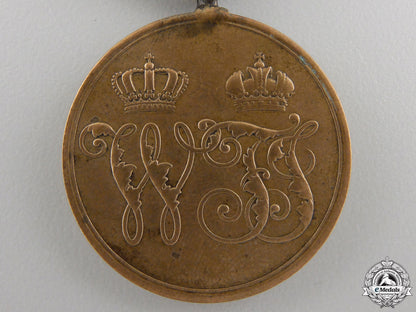 a1864_prussian_denmark_war_medal_for_combatants_img_02.jpg5565c1d3099e8