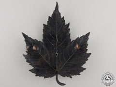 A King's Crown Canadian Police (Bobby Helmet) Beaver Badge