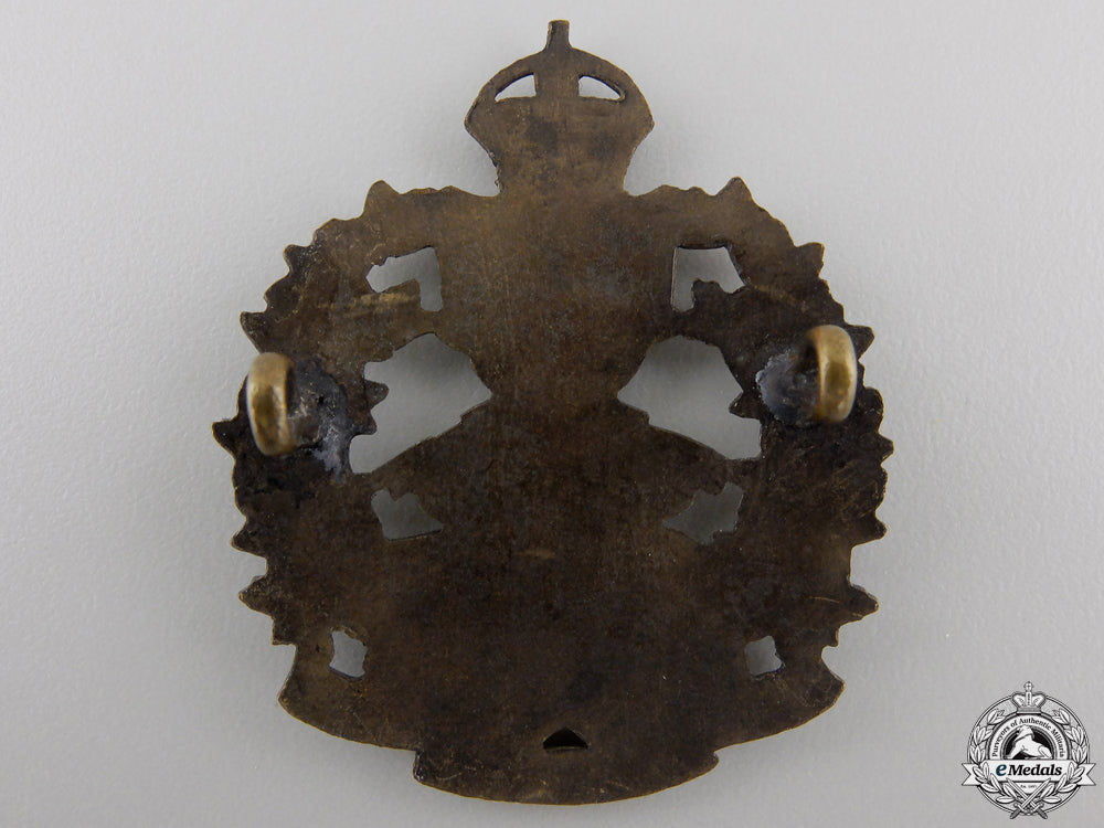 a103_rd_calgary_rifle_regiment_cap_badge_img_02.jpg55478eb0e700a