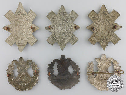 six_first&_second_war_british_highlander_cap_badges_img_02_25_16