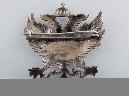 an_early_franco_period_falange_silver_badge_img_02.jpg55a545f1cc438