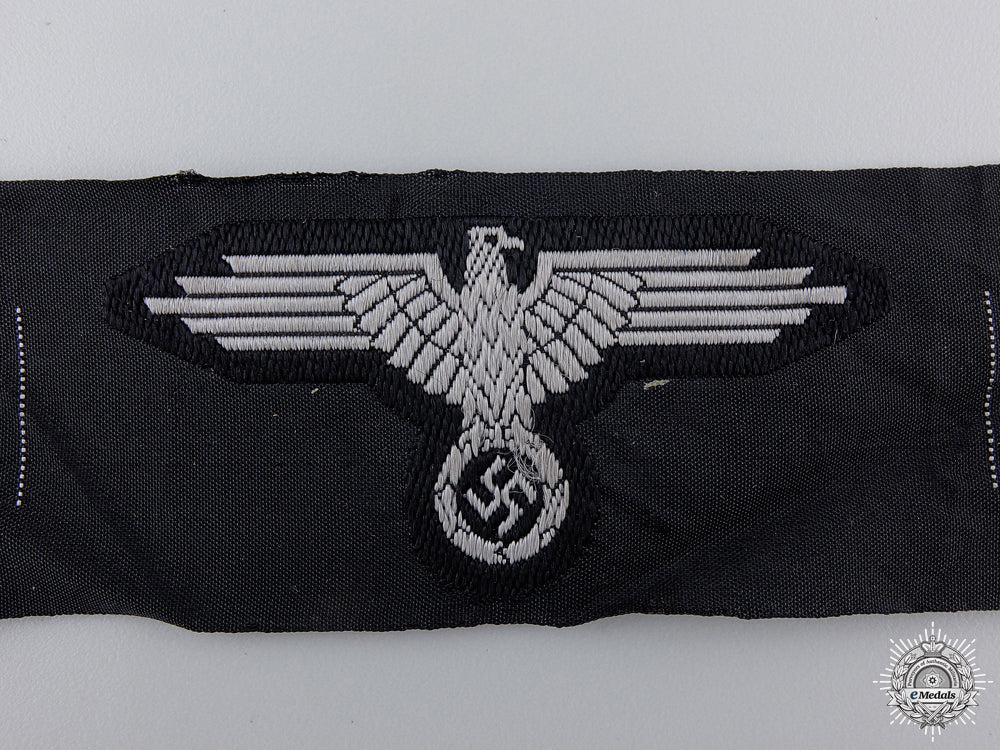 a_mint_section_of_waffen-_ss_field_cap_insignia_img_02.jpg54f875e7ca638