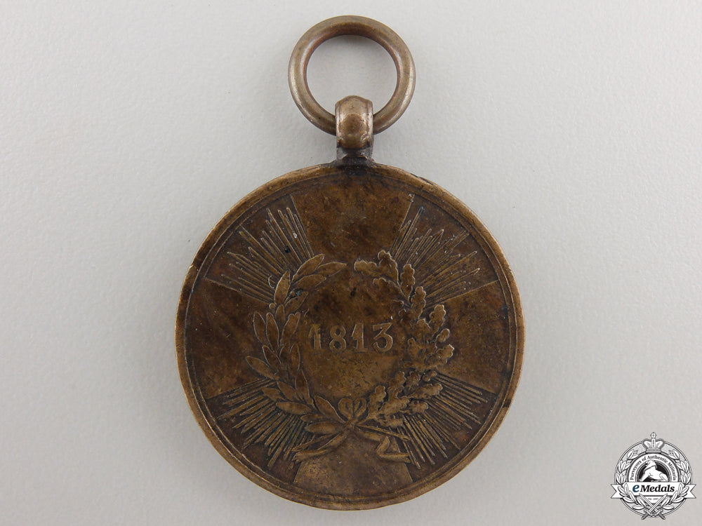 an1813_prussian_campaign_medal_for_combatants_img_02.jpg55846a5b5f04e