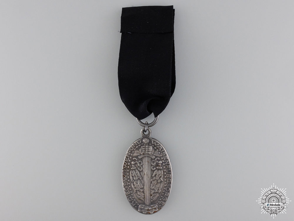 a_german1915_care_for_widows_and_orphans_medal_img_02.jpg54bfcc5f625f0