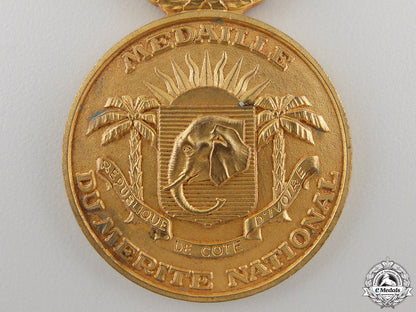 an_ivory_coast_medal_of_national_merit_medal;_gold_grade_img_02.jpg5565ea04f393a
