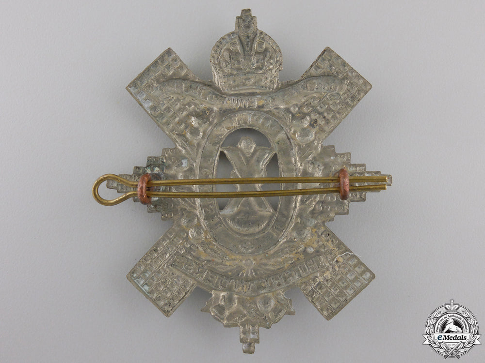 a_second_war_prince_edward_island_highlanders_cap_badge_img_02.jpg5553616bb1eb3