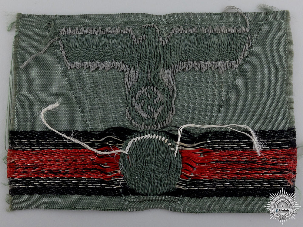 a_german_em/_nco’s_m43_army_trapezoid_cap_insignia_img_02.jpg54b0115731f77