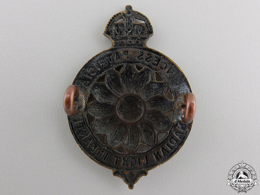 a_first_war_princess_patricia's_canadian_light_infantry_cap_badge_img_02.jpg555f5a97c7d86