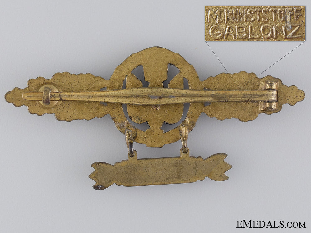 a_gold_bomber_pilot’s_clasp_with1200_hanger_by_m._kunststoff,_gablonz_img_02.jpg53f8a390b4af0