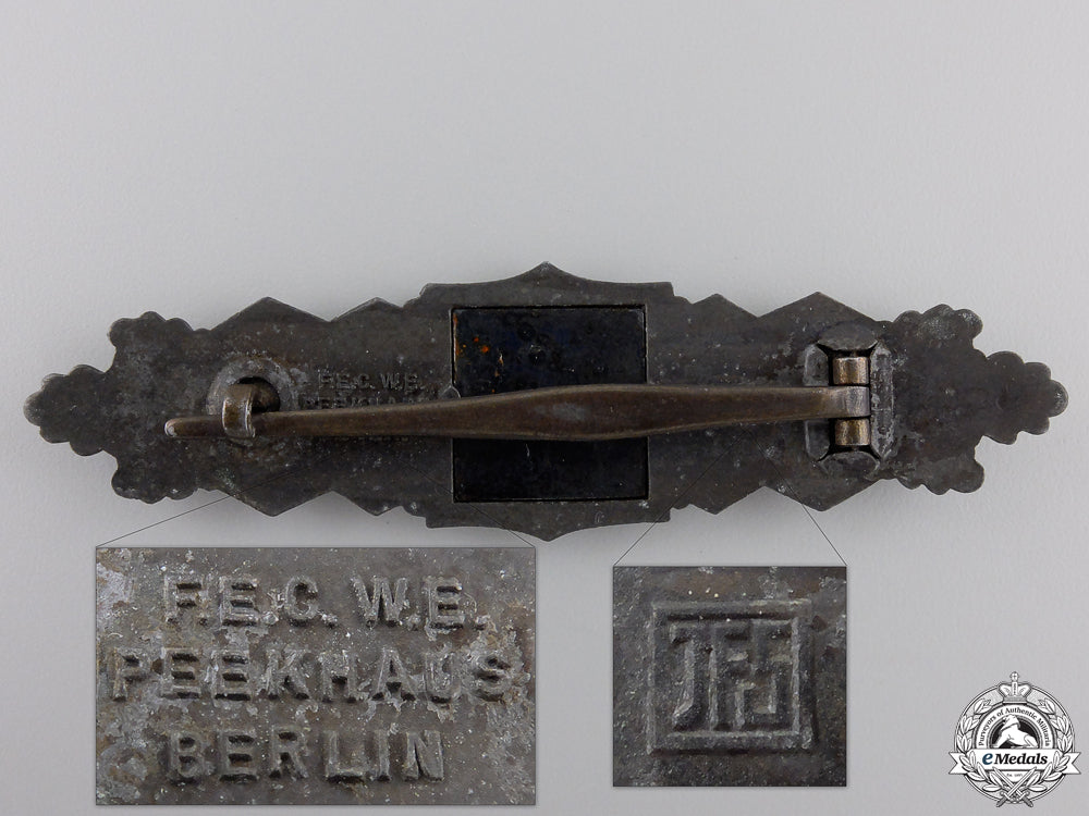 a_bronze_grade_close_combat_clasp_by_josef_feix&_söhne,_gablonz_img_02.jpg55491a5b04c64