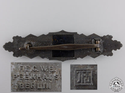 a_bronze_grade_close_combat_clasp_by_josef_feix&_söhne,_gablonz_img_02.jpg55491a5b04c64