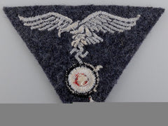 A Luftwaffe Em/Nco’s M43 Trapezoid Cap Insignia