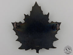 A Second War Canadian Red Cross Cap Badge