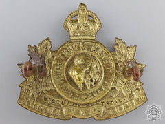 A Saskatchewan Mounted Rifles Cap Badge