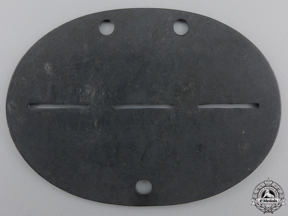 a_luftwaffe_stalag_guard’s_id_disc_img_02.jpg55282a2e16eb6