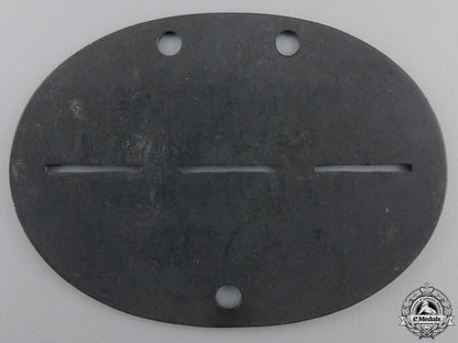 a_luftwaffe_stalag_guard’s_id_disc_img_02.jpg55282a2e16eb6
