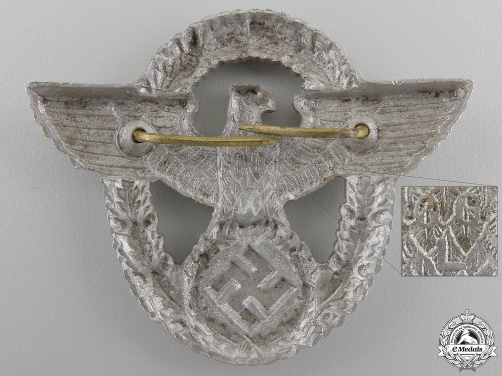 a_police_cap_badge_by_ogl_img_02.jpg55c238f8c8d58