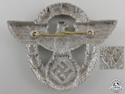 a_police_cap_badge_by_ogl_img_02.jpg55c238f8c8d58