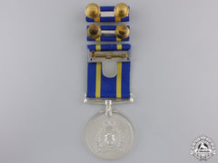 A Royal Canadian Mounted Police Long Service Medal To J.j.r. Potvin