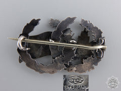 A First War Maple Leaf And Flag Sweetheart Badge