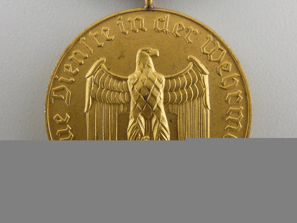 a_wehrmacht_long_service_medal_for12_years_of_service_img_02.jpg55d8aebbc22b0