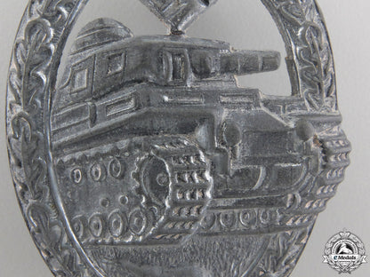 a_silver_grade_tank_assault_badge_by_rudolf_karneth&_söhne,_gablonz_img_02.jpg55520ee754b77