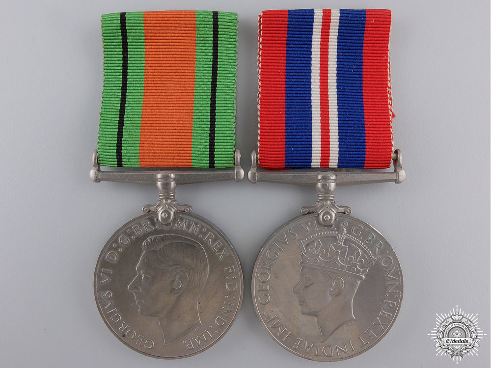 two_second_war_british_issue_service_medals_with_container_img_02.jpg54e768a530c07
