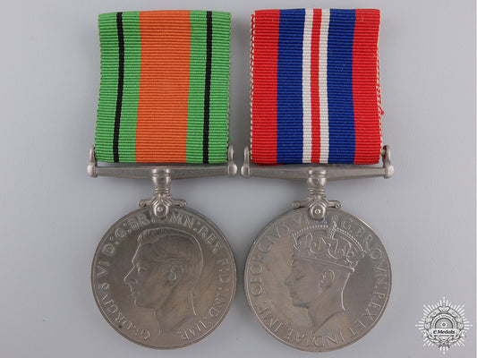 two_second_war_british_issue_service_medals_with_container_img_02.jpg54e768a530c07