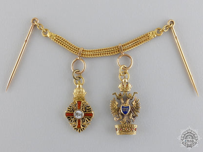 austria,_empire._an_exquisite_franz_joseph&_iron_crown_miniature_pair_in_gold_c.1890_img_02.jpg547745d8dfdb4_1