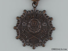 A Chinese Military Police Meritorious Service Medal