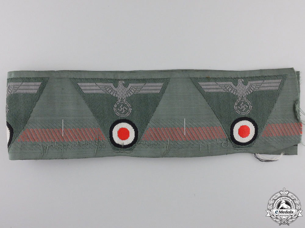 a_mint_strip_of_german_m43_trapezoid_cap_insignia_img_02.jpg5550e2a6acd82